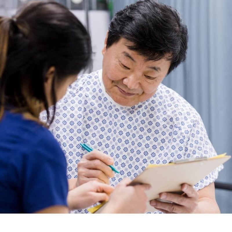 Doctor getting consent from patient